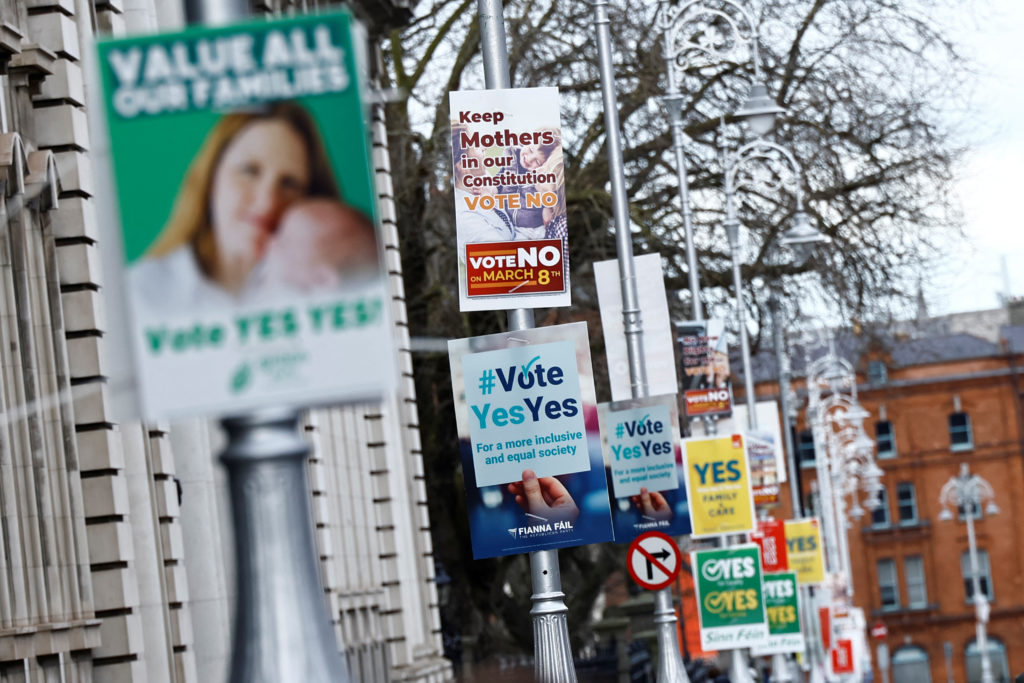 Posters in advance of the referendums (photo credit: PBS)