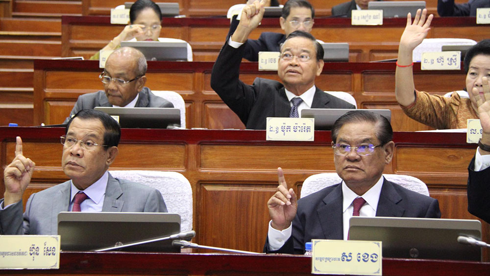 Bottom L-R: Prime Minister Hun Sen next to Deputy Prime Minister / Interior Minister Sar Kheng in Cambodia's National Assembly, 2017 (photo credit: Cambodia National Assembly)