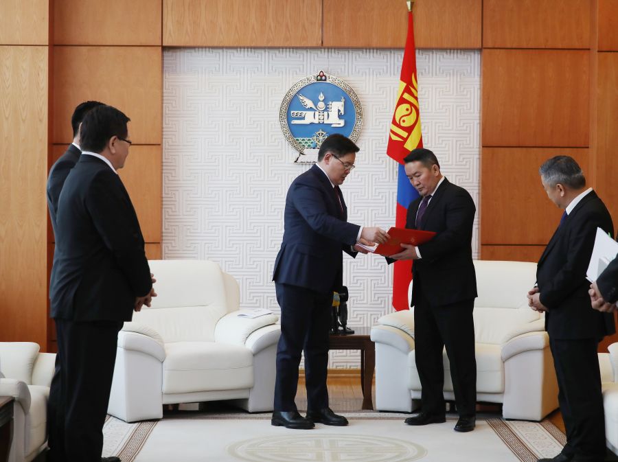 President of Mongolia - second from right - receives proposed constitutional amendments from speaker - second from left (photo credit: Montsame)