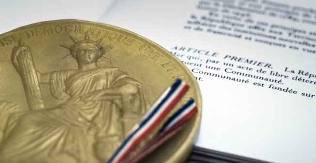 Seal and article 1 of the 1958 French Constitution (photo credit: Joel Saget/AFP)