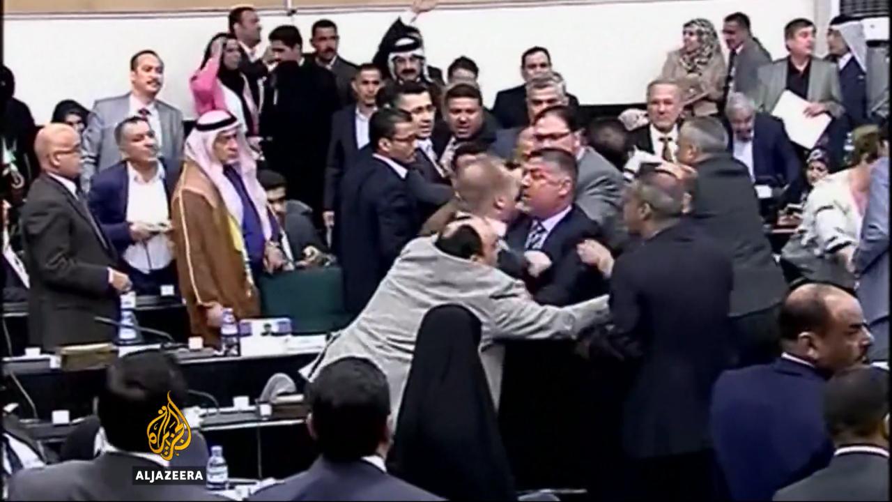 Iraqi MPs tussle over removal of Speaker (photo credit: Aljazeera)