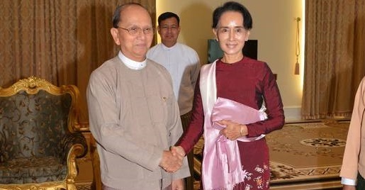 Myanmar's President Thein Sein shakes hands with election-winning leader Aung San Suu Kyi before their meeting on transfer of power on Dec 2 2015. (photo credit: AP) 