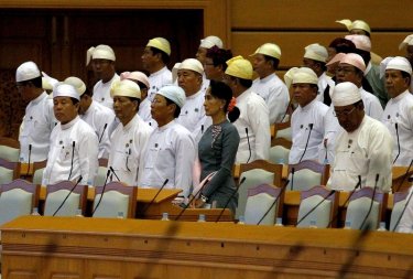 NLD party leader Aung San Suu Kyi attends Myanmar's first parliament meeting after the November 8 general elections, at the Lower House of Parliament in Naypyitaw (photo credit: REUTERS)