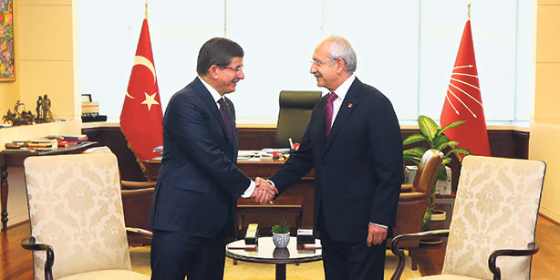 Turkey's acting Prime Minister Ahmet Davutoğlu and CHP Deputy Chairman Haluk Koç [photo credit: Cihan]