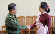 Daw Aung San Suu Kyi met with Senior Gen. Min Aung Hlaing after a meeting in 2015 (photo credit: Hyo Hein Kyaw/Agence France-Presse — Getty Image)