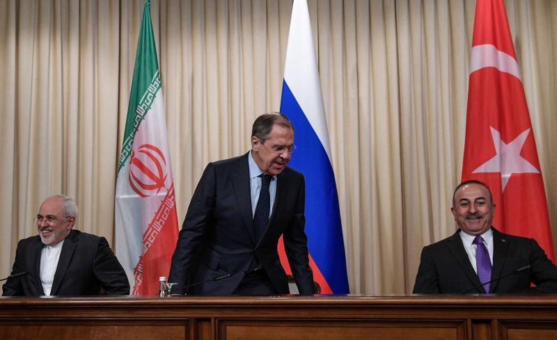 Russian Foreign Minister Sergei Lavrov (C), Turkish Foreign Minister Mevlut Cavusoglu (R) and Iranian Foreign Minister Mohammad Javad Zarif (photo credit: The Arab Weekly)