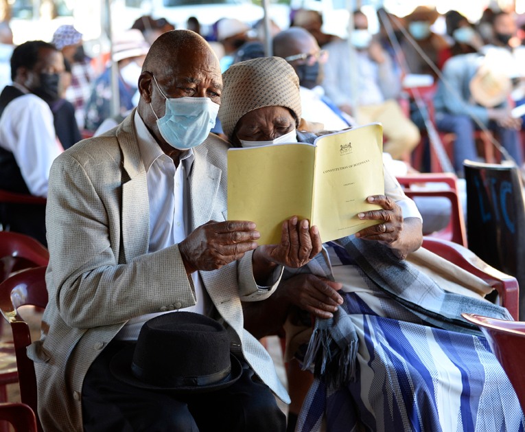 Peleng East residents read the constitution before public consultation in Lobatse on 9 February 2022 (photo credit  Felicity Male via DailyNews)