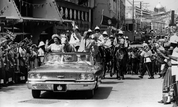  The Queen and Prince Philip driving through Barbados waving to the crowds on their 1966 tour (photo credit: The Guardian)