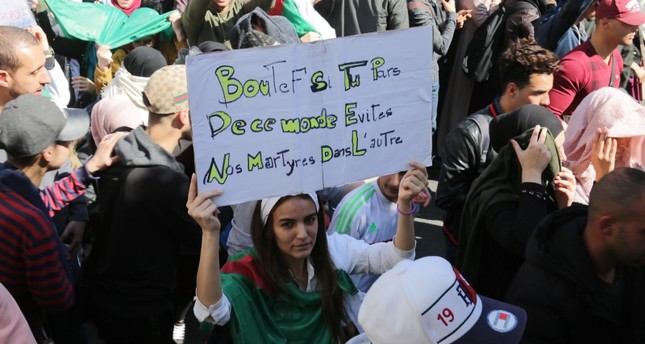 Protesters in Algeria (photo credit: Daily Sabah)
