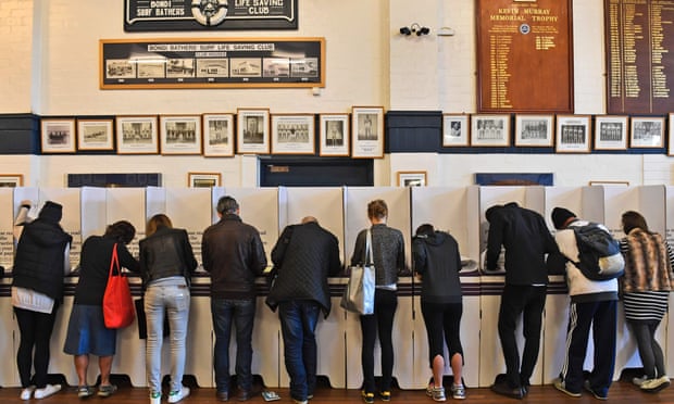 Voters prepare to cast their votes (photon credit: William West/AFP/Getty Images)