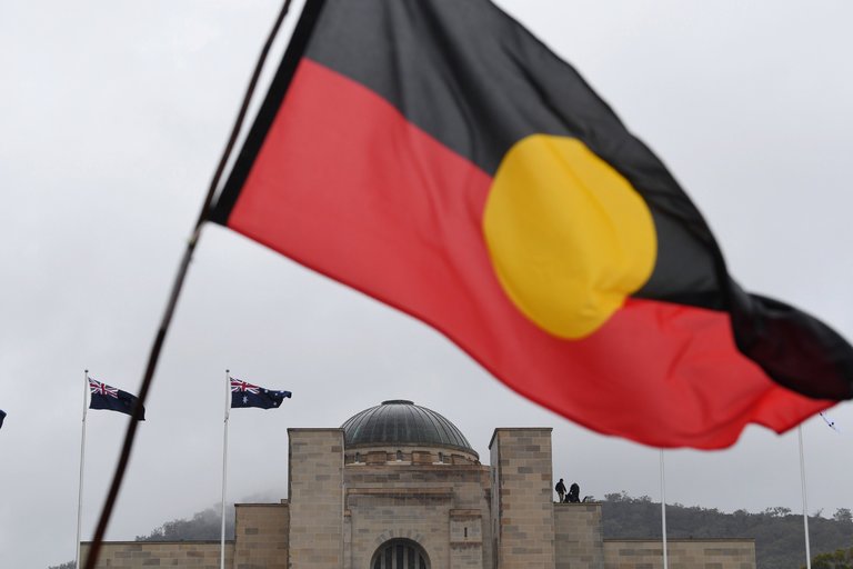 An Aboriginal Flag over the Australian War Memorial in Canberra ( Photo credit: Lukas Coch/European Pressphoto)Agency