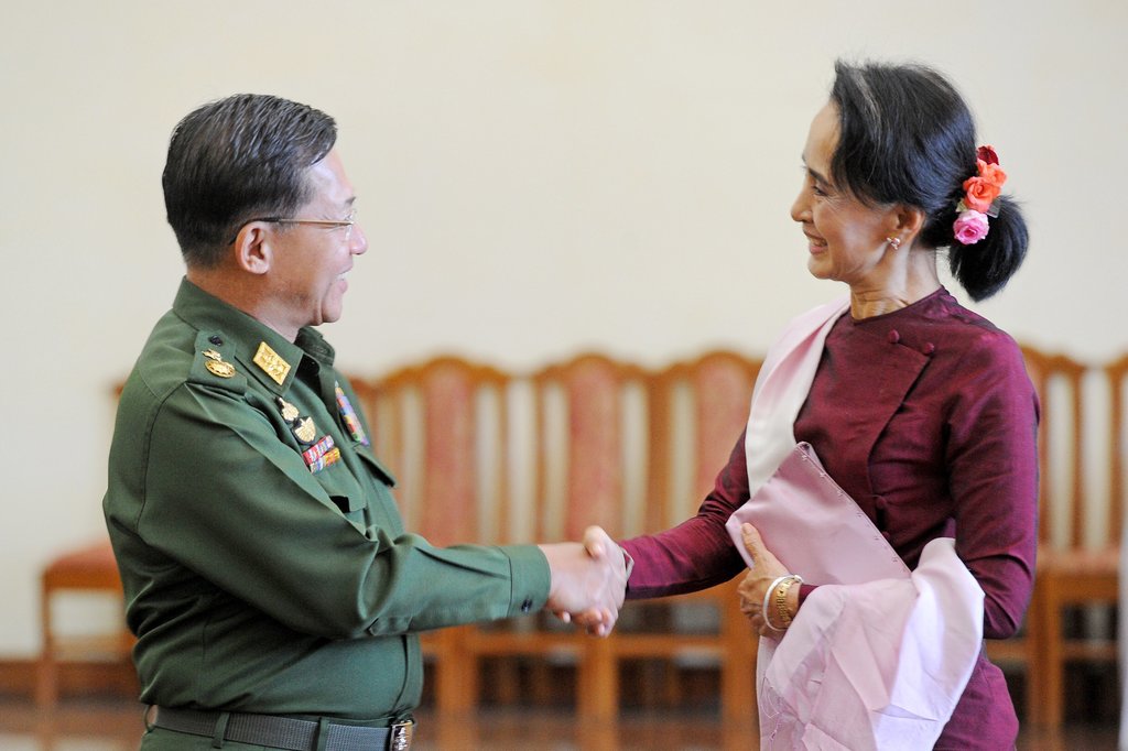 Daw Aung San Suu Kyi met with Senior Gen. Min Aung Hlaing after a meeting in 2015 (photo credit: Hyo Hein Kyaw/Agence France-Presse — Getty Image)