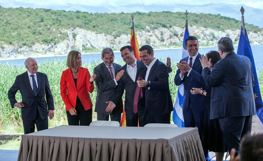 Macedonian PM Zoran Zaev and Greek PM Alexis Tsipiras before Sign the Prespa Agreement  (photo credit: Nikos Arvanitidis/EPA/New York Times)