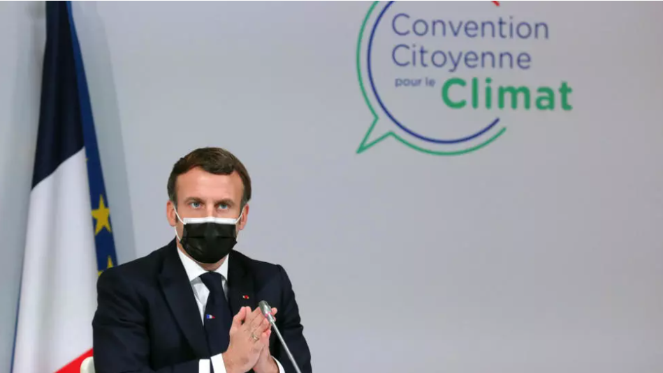 French President Emmanuel Macron at the Citizens' Convention on Climate (CCC) in December 2020 (photo credit: Thibault Camus, AFP)