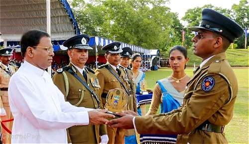 President Maithripala Sirisena greets the police forces (photo credit: New India Express)