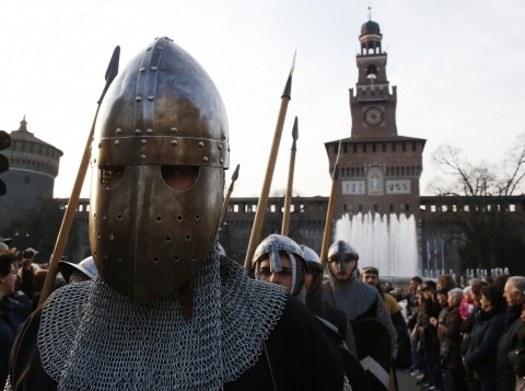 Performers dressed in medieval attire (photo credit: Luca Bruno/AP)