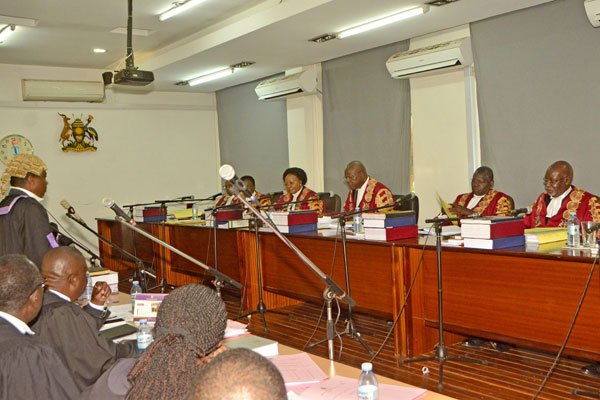 Court session. The panel of judges during the age limit appeal at the Supreme Court (photo credit: Michael Kakumirizi)