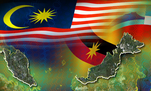 Overlapping flags of Malaysia, Sabah, and Sarawak (photo credit: Malaysiakini)