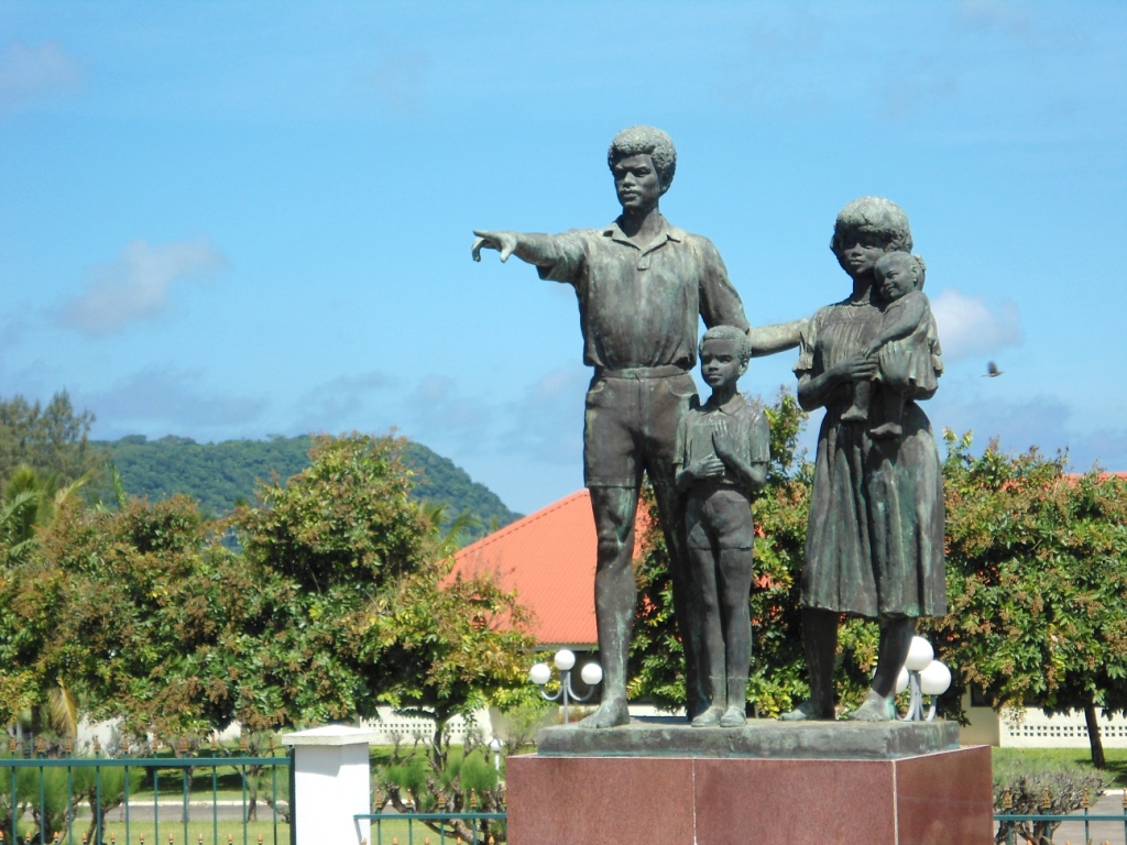 Statue outside Vanuatu's parliament (photo credit:  Jean Van Jean via Wikimedia Commons)