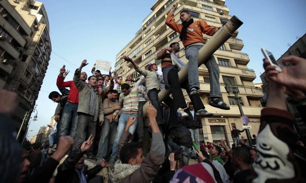 Egyptian anti-government protesters. (Lefteris Pitarakis/AP)