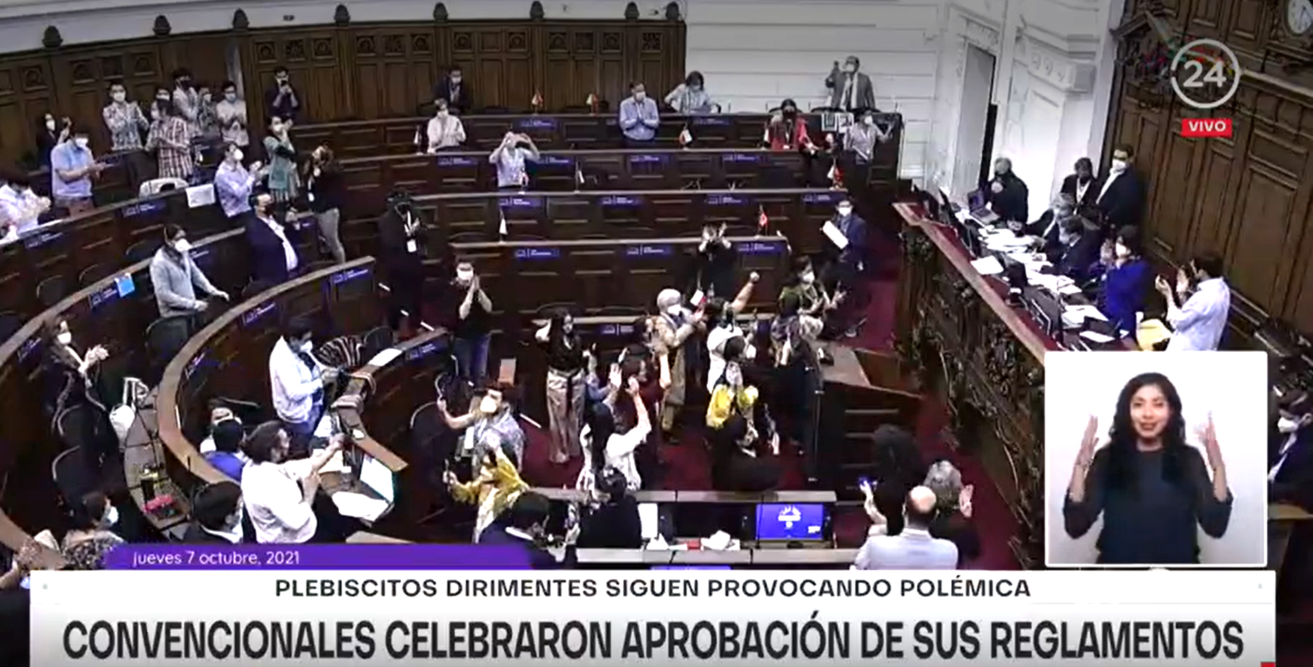 Constitutional Convention delegates celebrate the approval of the rules of procedure (photo credit: Televisión Nacional de Chile)