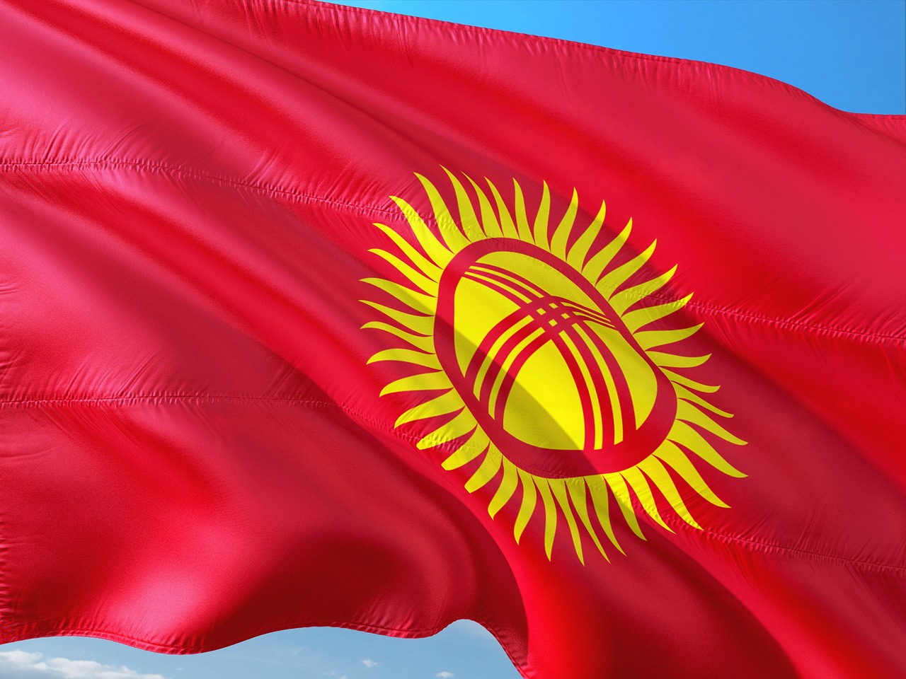 Flag of Kyrgyzstan (photo credit: jorono via pixabay) Flag of Kyrgyzstan (photo credit: jorono via pixabay)