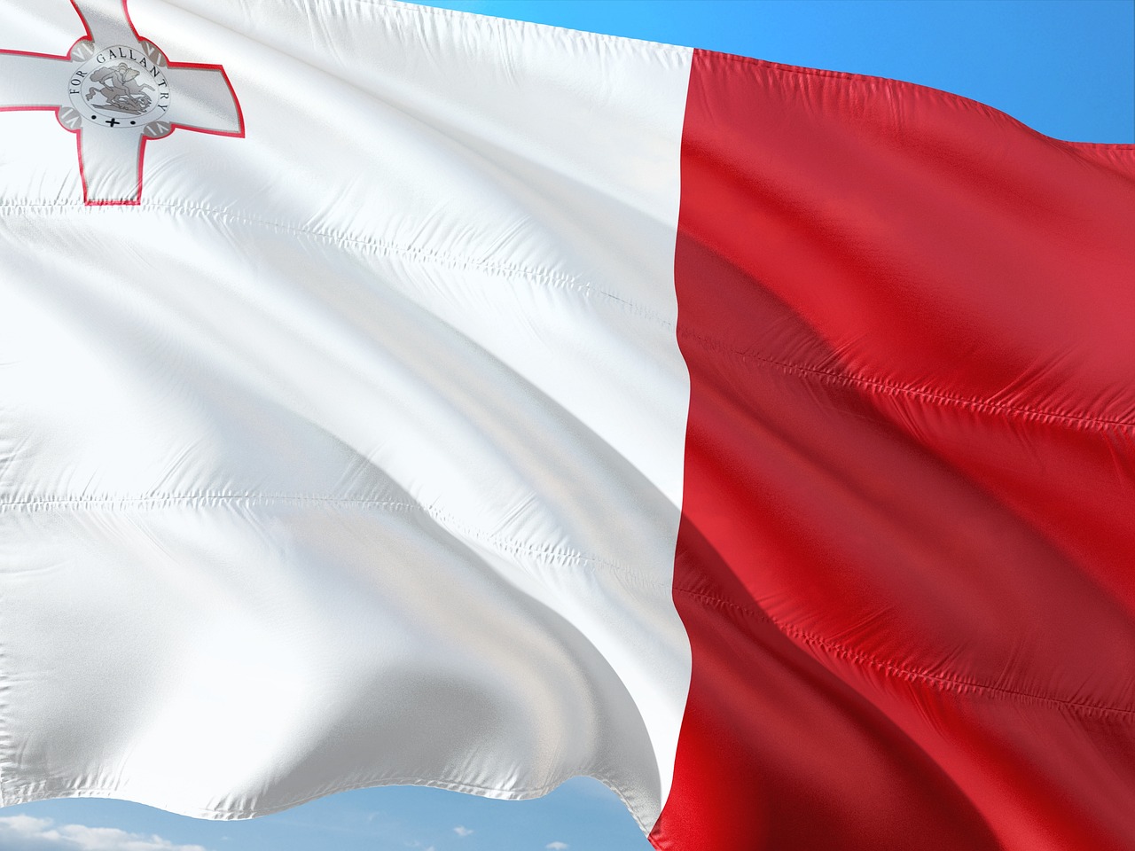 Flag of Malta (photo credit: jorono via pixabay) Flag of Malta (photo credit: jorono via pixabay)