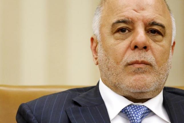 Iraq's Prime Minister Haider al-Abadi listens to remarks to reporters by U.S. President Barack Obama after their bilateral meeting in the Oval Office at the White House in Washington April 14, 2015. (photo credit: Reuters)