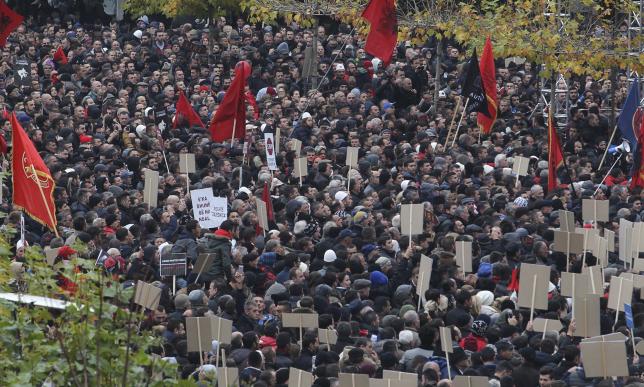 People gather in a peaceful protest called by Kosovo's opposition against the EU-brokered accord between Kosovo and Serbia in the capital Pristina, November 28, 2015. (photo credit: Reuters)