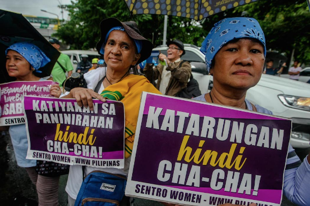 A group of women take part in a protest against proposed charter changes in Manila (photo credit: Jire Carreon)
