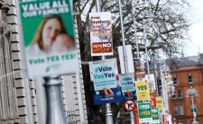 Posters in advance of the referendums (photo credit: PBS)