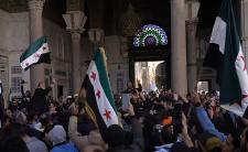 Celebrations at the Umayyad Mosque after the fall of the Assad regime (photo credit LLs via Wikimedia Commons) 