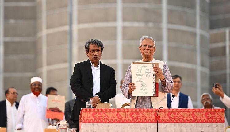 Professor Muhammad Yunus, Chief Advisor and Chairman of the National Consensus Commission, presents the July National Charter to the public after its signing (credit: Press Information Department of Bangladesh via Wikimedia Commons)