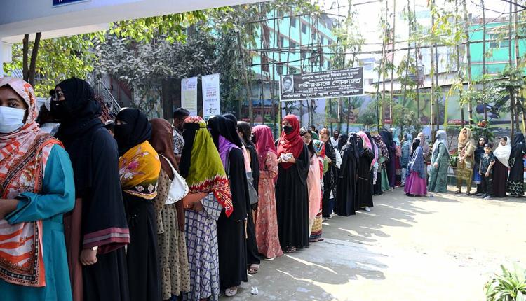 Voters lining at polling station to cast their ballots for the 13th National Parliament Election and the 2026 Referendum (credit: Press Information Department of Bangladesh via Wikimedia Commons)