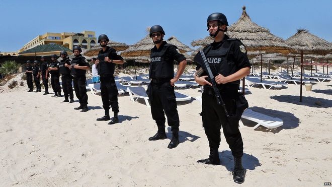 Armed members of Tunisia's security forces were deployed to the beach at Sousse for a ceremony of remembrance one week after the attack (photo credit: BBC)
