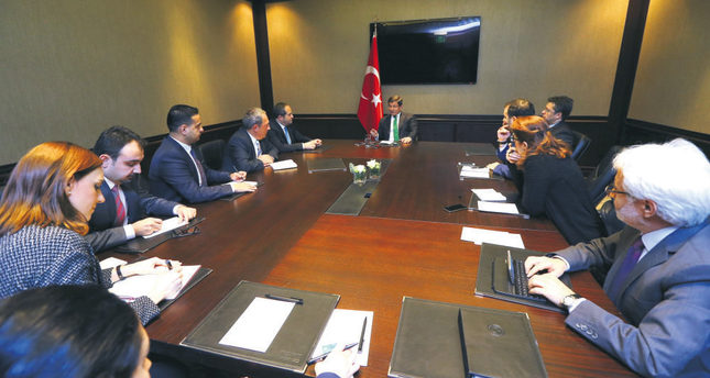 Prime Minister Davutoğlu with journalists in Belgrade on Dec. 28. (photo credit: Daily Sabah)